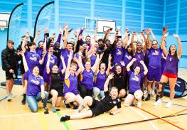College sports students cheering in gym hall 